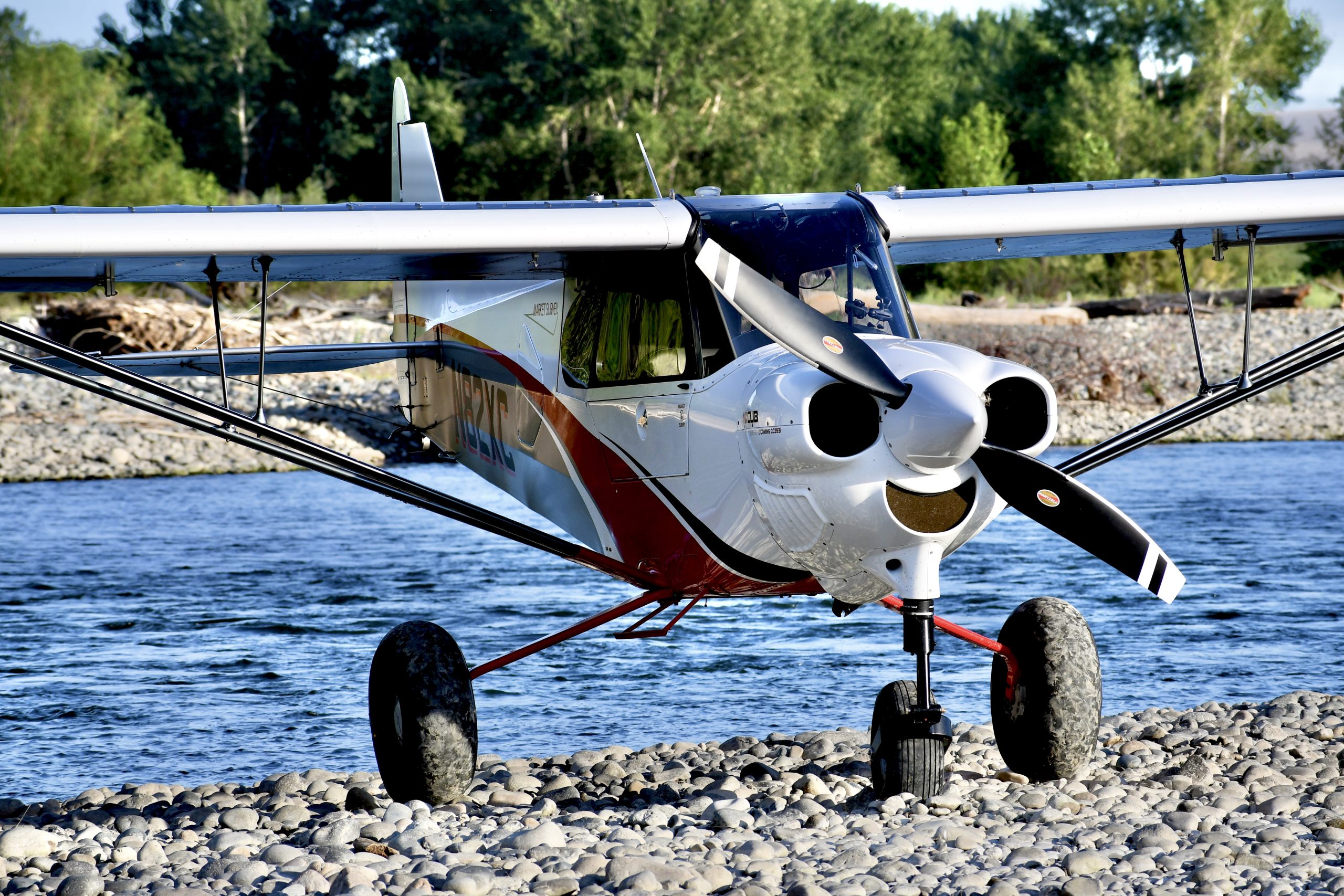 CubCrafters NXCub on the Yakima River gravel bar — nosewheel backcountry aircraft