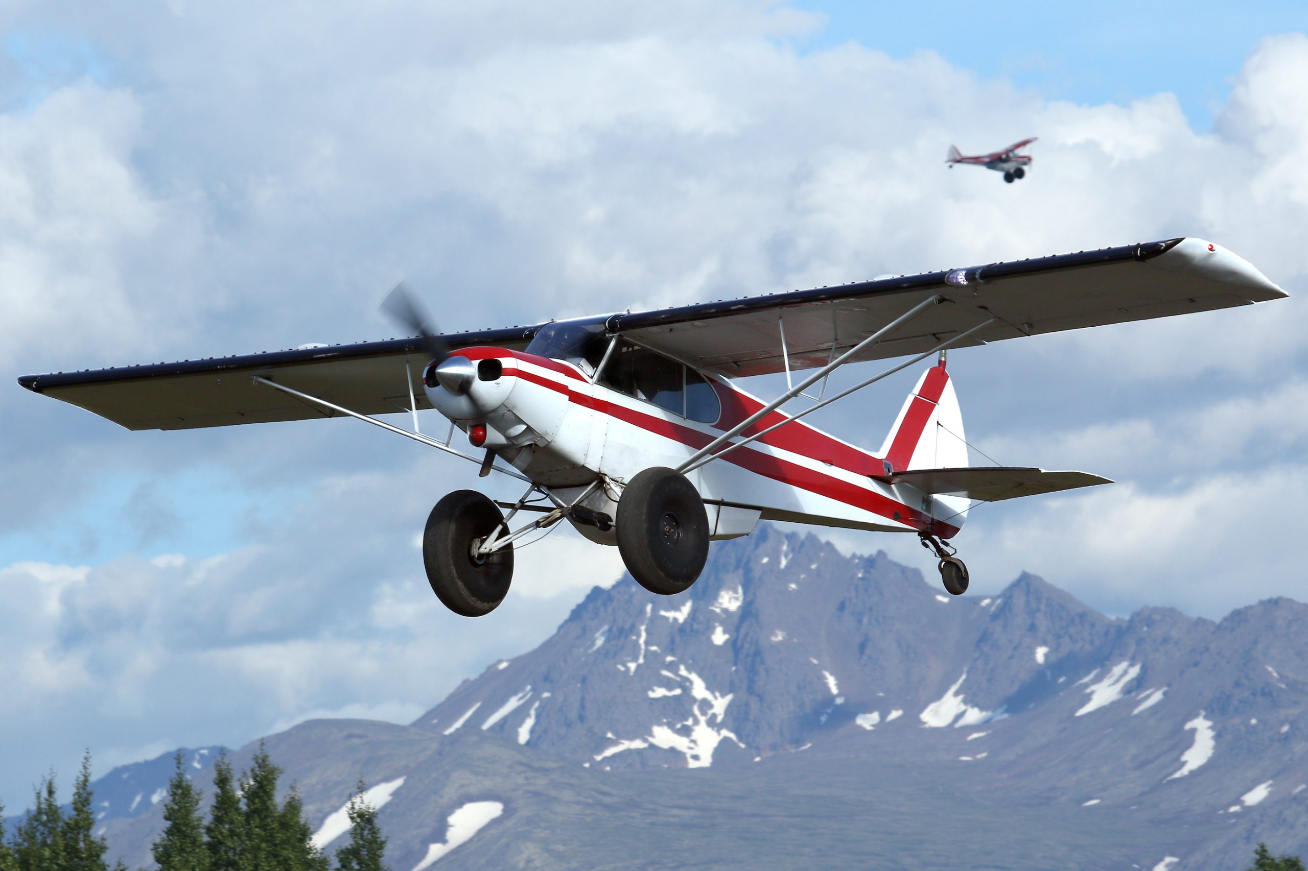 Backcountry taildragger aircraft over the Alaska mountains